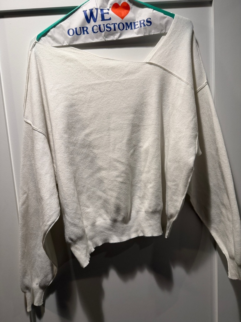 Line and dot Women's white Sweater size medium, seam
Detail, from bloomies